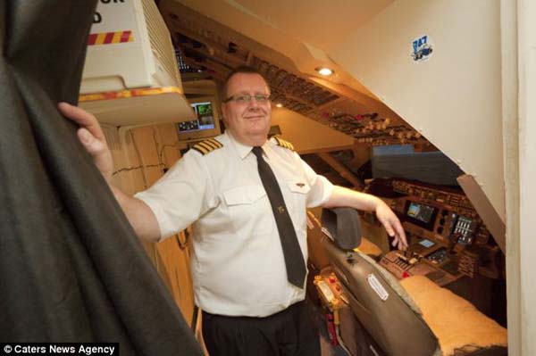 Forced to give up his dream of being a pilot, this man builds a life sized Boeing simulator in his house!