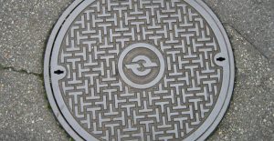why are manhole covers round
