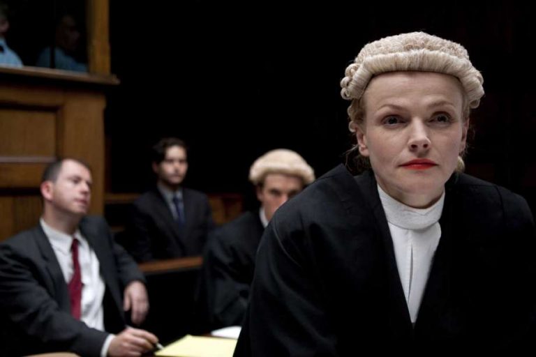 Why do british lawyers and judges wear wigs?